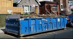 roll off dumpster in Albany NY filled with garbage